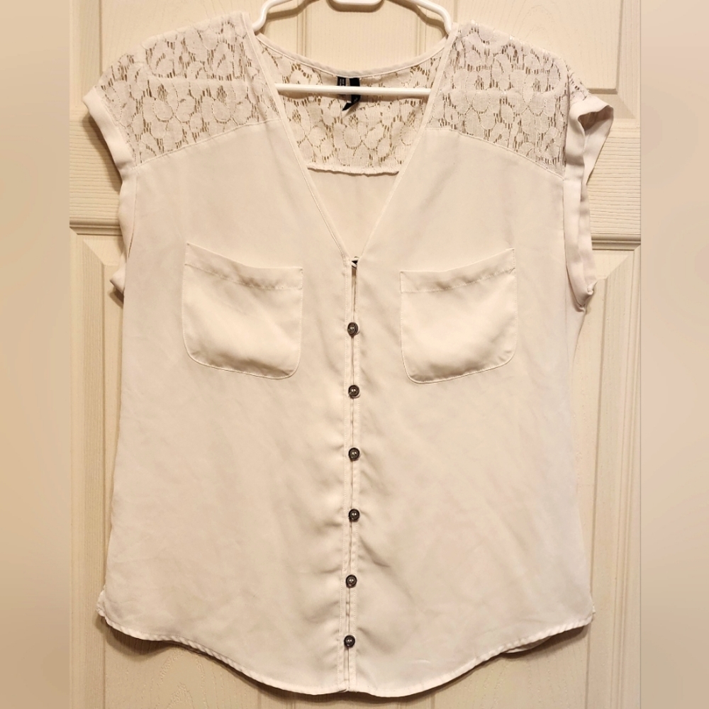 Women's white button down blouse with lace embellishment